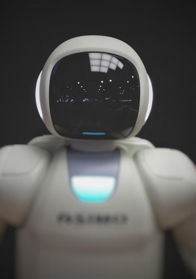 A humanoid robot against a dark background